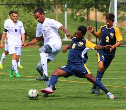 action shot of male soccer players